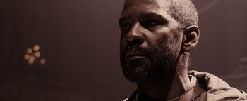 Movie still from “The Book of Eli” (2010), directed by Allen Hughes – A black man with a beard looking to his left; Close Up shot, Low angle