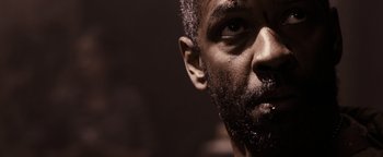 Movie still from “The Book of Eli” (2010), directed by Allen Hughes – A person with a beard; Close Up shot, Low angle