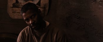 Movie still from “The Book of Eli” (2010), directed by Allen Hughes – A person with a beard; Close Up shot, Over the shoulder angle