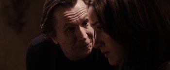 Movie still from “The Book of Eli” (2010), directed by Allen Hughes – A man and a woman looking at each other; Close Up shot, Over the shoulder angle