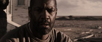 Movie still from “The Book of Eli” (2010), directed by Allen Hughes – A person with a beard; Close Up shot, Over the shoulder angle
