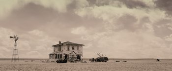 Movie still from “The Book of Eli” (2010), directed by Allen Hughes – An old house in the middle of a desert; Extreme Wide shot, Low angle