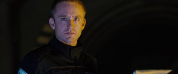 Movie still from “Pandorum” (2009), directed by Christian Alvart – A person wearing a jacket; Close Up shot, Low angle