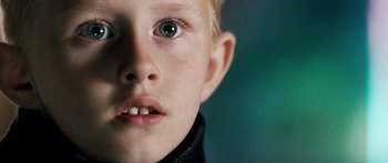 Movie still from “Pandorum” (2009), directed by Christian Alvart – A young boy's face; Close Up shot, Low angle