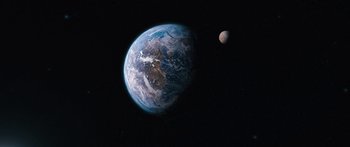 Movie still from “Pandorum” (2009), directed by Christian Alvart – An image of an earth and moon in space; Extreme Wide shot, High angle