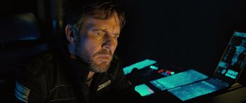 Movie still from “Pandorum” (2009), directed by Christian Alvart – A person in a dark room; Close Up shot, Low angle