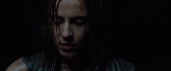 Movie still from “Pandorum” (2009), directed by Christian Alvart – A man with wet hair and a black jacket; Close Up shot, Low angle