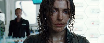 Movie still from “Pandorum” (2009), directed by Christian Alvart – A person with wet hair; Close Up shot, Over the shoulder angle