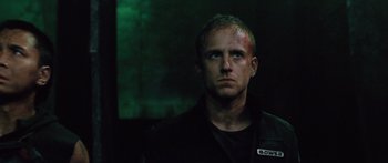 Movie still from “Pandorum” (2009), directed by Christian Alvart – A person wearing a jacket; Close Up shot, Low angle