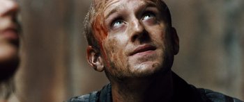 Movie still from “Pandorum” (2009), directed by Christian Alvart – A person with blood all over his face; Close Up shot, Low angle