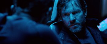 Movie still from “Pandorum” (2009), directed by Christian Alvart – A person wearing a jacket; Close Up shot, Over the shoulder angle