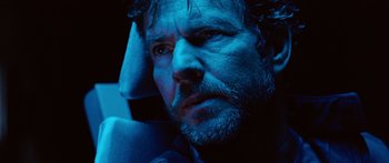 Movie still from “Pandorum” (2009), directed by Christian Alvart – A person with a beard; Close Up shot, Low angle