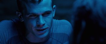 Movie still from “Pandorum” (2009), directed by Christian Alvart – A person wearing a shirt; Close Up shot, Over the shoulder angle