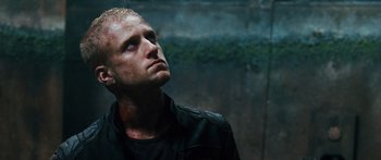 Movie still from “Pandorum” (2009), directed by Christian Alvart – A person wearing a jacket; Close Up shot, Low angle