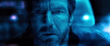 Movie still from “Pandorum” (2009), directed by Christian Alvart – A man's face in blue light; Close Up shot, Low angle