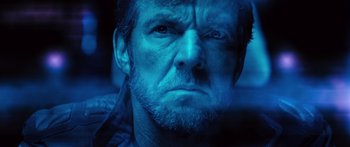 Movie still from “Pandorum” (2009), directed by Christian Alvart – A man's face in blue light; Close Up shot, Low angle