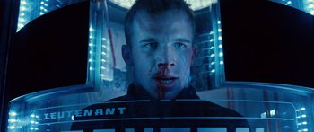 Movie still from “Pandorum” (2009), directed by Christian Alvart – A person with blood on his face; Close Up shot, Low angle