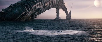 Movie still from “Pandorum” (2009), directed by Christian Alvart – A man on a surfboard in front of an abandoned ship; Extreme Wide shot, Low angle