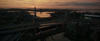 Movie still from “Patriots Day” (2016), directed by Peter Berg – An aerial view of a bridge and a body of water; Extreme Wide shot, High angle