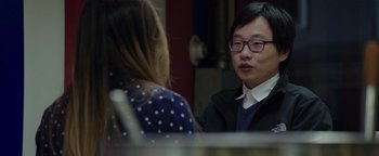 Movie still from “Patriots Day” (2016), directed by Peter Berg – A man and a woman are sitting at a table talking; Close Up shot, Over the shoulder angle