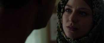 Movie still from “Patriots Day” (2016), directed by Peter Berg – A person wearing a headscarf; Close Up shot, Over the shoulder angle