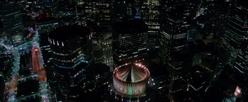 Movie still from “Patriots Day” (2016), directed by Peter Berg – An aerial view of a city lit up at night; Extreme Wide shot, High angle
