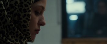 Movie still from “Patriots Day” (2016), directed by Peter Berg – A person's face in a room; Close Up shot, Low angle