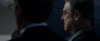 Movie still from “Patriots Day” (2016), directed by Peter Berg – A person looking at a wall; Close Up shot, Low angle