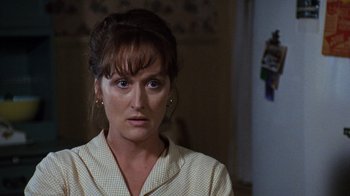 Movie still from “The Bridges of Madison County” (1995), directed by Clint Eastwood – A person wearing a shirt; Close Up shot, Over the shoulder angle