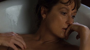 Movie still from “The Bridges of Madison County” (1995), directed by Clint Eastwood – A person with her hand on her chin; Close Up shot, Overhead angle