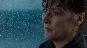 A person looking out of a window
