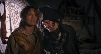 Movie still from “The Brothers Grimm” (2005), directed by Terry Gilliam – A man and a woman dressed in pirate costumes; Close Up shot, Over the shoulder angle
