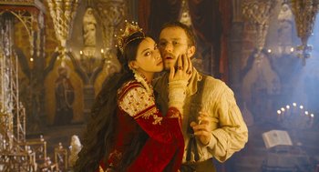 Movie still from “The Brothers Grimm” (2005), directed by Terry Gilliam – A man and a woman dressed in medieval garb; Medium shot, Over the shoulder angle