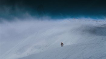 Movie still from “The Bucket List” (2007), directed by Rob Reiner – A person is skiing down a snowy slope; Extreme Wide shot, Low angle