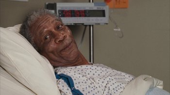 Movie still from “The Bucket List” (2007), directed by Rob Reiner – An older man laying in a hospital bed; Close Up shot, High angle
