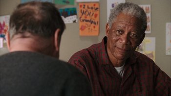 Movie still from “The Bucket List” (2007), directed by Rob Reiner – Two older men sitting in front of each other in a room; Close Up shot, Over the shoulder angle