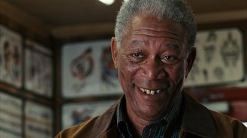 Movie still from “The Bucket List” (2007), directed by Rob Reiner – An older man smiling for the camera; Close Up shot, Low angle