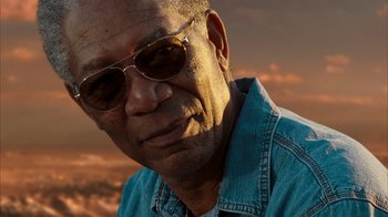 Movie still from “The Bucket List” (2007), directed by Rob Reiner – An older man wearing a jean jacket and sunglasses; Close Up shot, Low angle