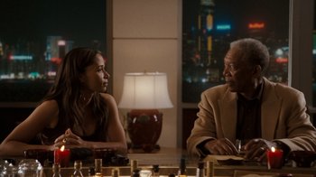 Movie still from “The Bucket List” (2007), directed by Rob Reiner – A man and a woman sitting at a dinner table; Medium shot, Over the shoulder angle