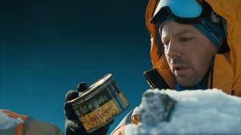 Movie still from “The Bucket List” (2007), directed by Rob Reiner – A man holding a coffee can in his hand; Close Up shot, Low angle