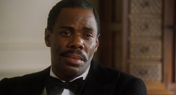 Movie still from “The Butler” (2013), directed by Lee Daniels – A person wearing a suit and bow tie; Close Up shot, Low angle