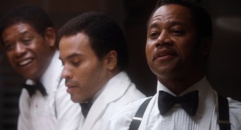 Movie still from “The Butler” (2013), directed by Lee Daniels – A group of men in white shirts and bow ties; Close Up shot, Low angle