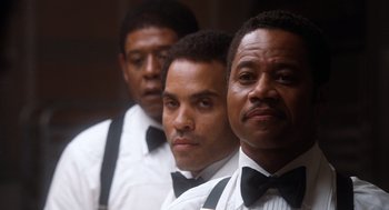 Movie still from “The Butler” (2013), directed by Lee Daniels – A group of three men standing next to each other; Close Up shot, Low angle