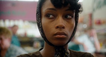 Movie still from “The Butler” (2013), directed by Lee Daniels – A person wearing a neck scarf; Close Up shot, Over the shoulder angle