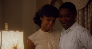 Movie still from “The Butler” (2013), directed by Lee Daniels – A man and a woman standing next to each other in a room; Close Up shot, Over the shoulder angle