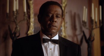 Movie still from “The Butler” (2013), directed by Lee Daniels – A man wearing a suit and bow tie; Close Up shot, Low angle