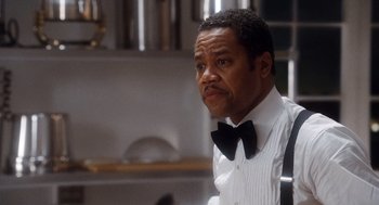 Movie still from “The Butler” (2013), directed by Lee Daniels – A man wearing a white shirt and a black bow tie; Close Up shot, Over the shoulder angle