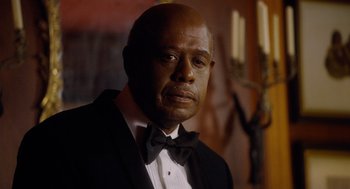 Movie still from “The Butler” (2013), directed by Lee Daniels – A man in a suit and a bow tie; Close Up shot, Over the shoulder angle