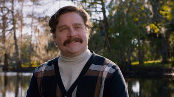 Movie still from “The Campaign” (2012), directed by Jay Roach – A person wearing a sweater; Close Up shot, Over the shoulder angle