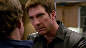 Movie still from “The Campaign” (2012), directed by Jay Roach – A man that is talking to another man; Close Up shot, Over the shoulder angle